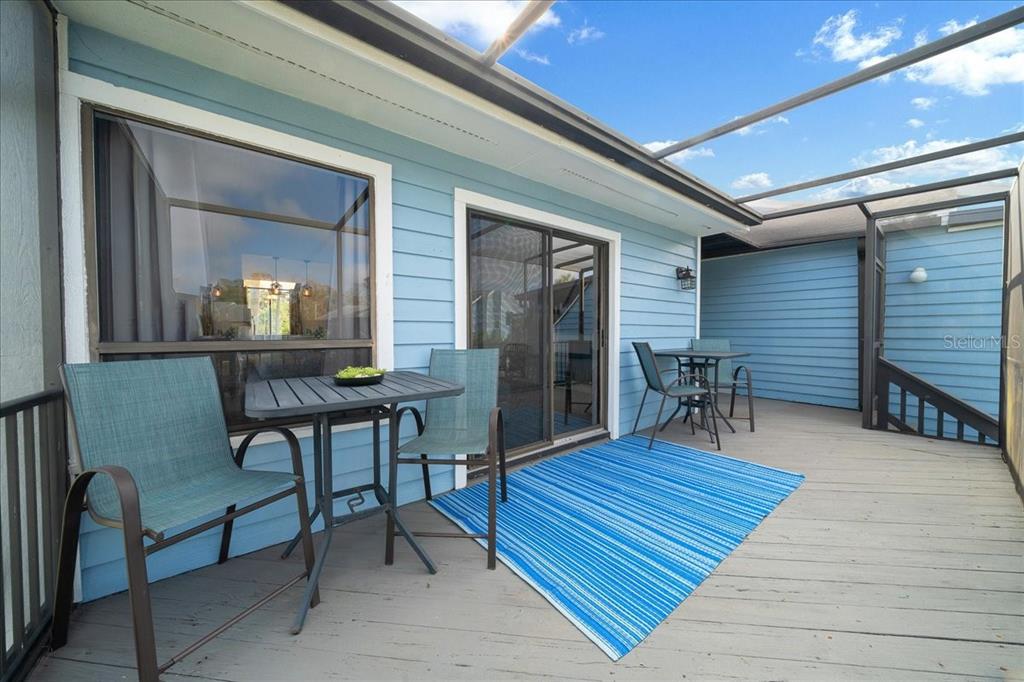 2925 North Rivers Edge Boulevard, Unit 2925 Crystal River, FL 34429 - Photo 20 of 79 a view of a dinning table and chairs in patio