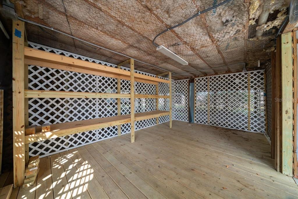 2925 North Rivers Edge Boulevard, Unit 2925 Crystal River, FL 34429 - Photo 35 of 79 a view of outdoor space with wooden fence