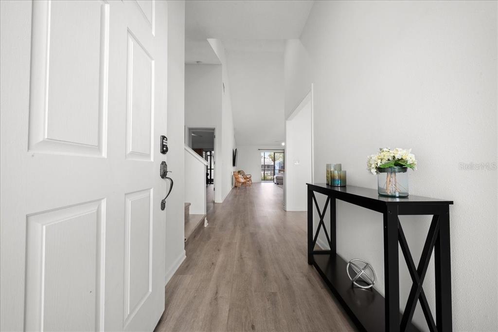 2925 North Rivers Edge Boulevard, Unit 2925 Crystal River, FL 34429 - Photo 4 of 79 a view of entryway with wooden floor