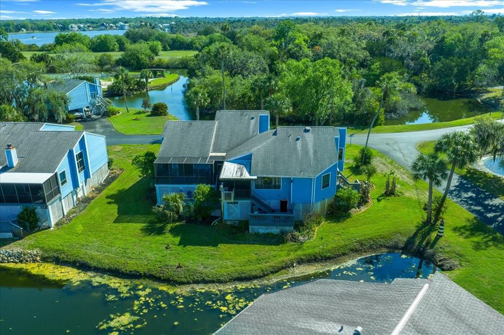 2925 North Rivers Edge Boulevard, Unit 2925 Crystal River, FL 34429 - Photo 54 of 79 an aerial view of a house with big yard