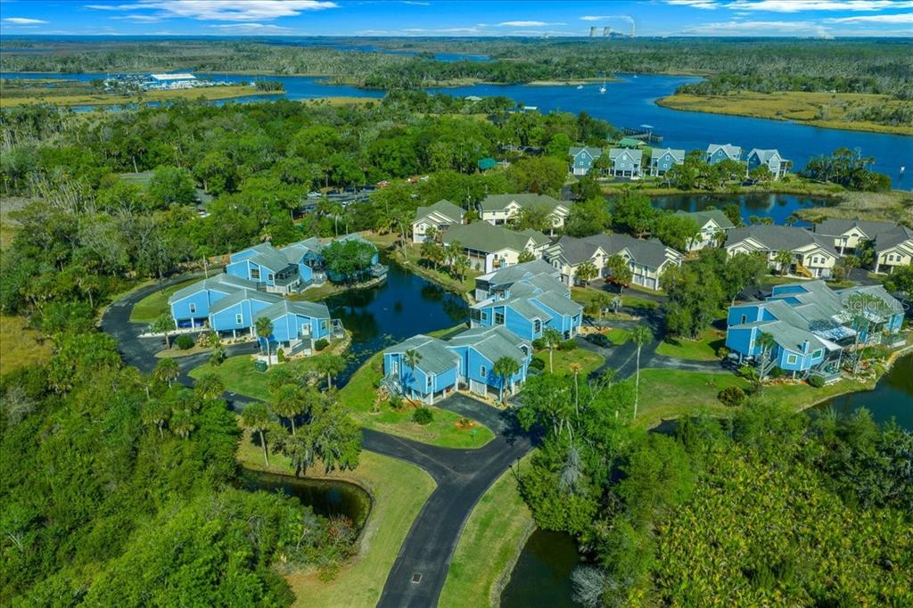 2925 North Rivers Edge Boulevard, Unit 2925 Crystal River, FL 34429 - Photo 58 of 79 a view of a lake with a houses