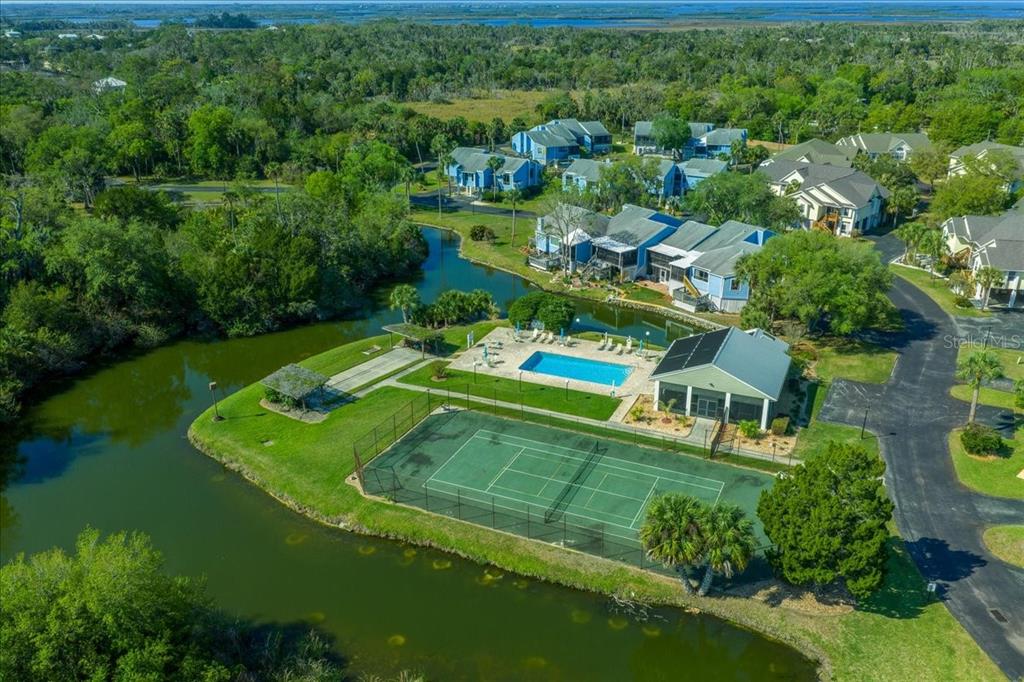2925 North Rivers Edge Boulevard, Unit 2925 Crystal River, FL 34429 - Photo 61 of 79 an aerial view of a house with a yard