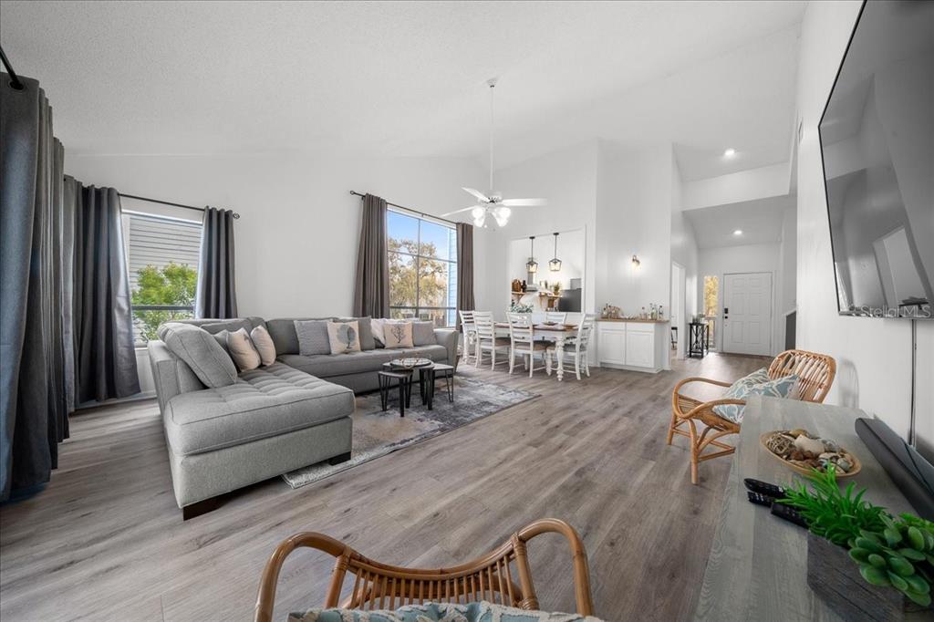 2925 North Rivers Edge Boulevard, Unit 2925 Crystal River, FL 34429 - Photo 73 of 79 a living room with furniture and a wooden floor