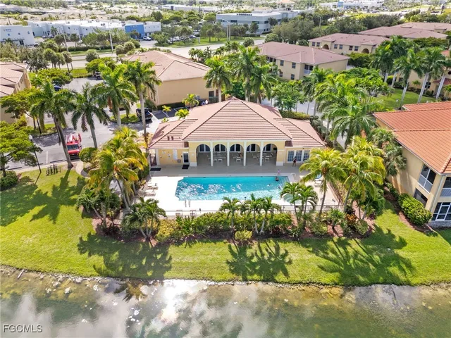 an aerial view of a house with a garden and plants