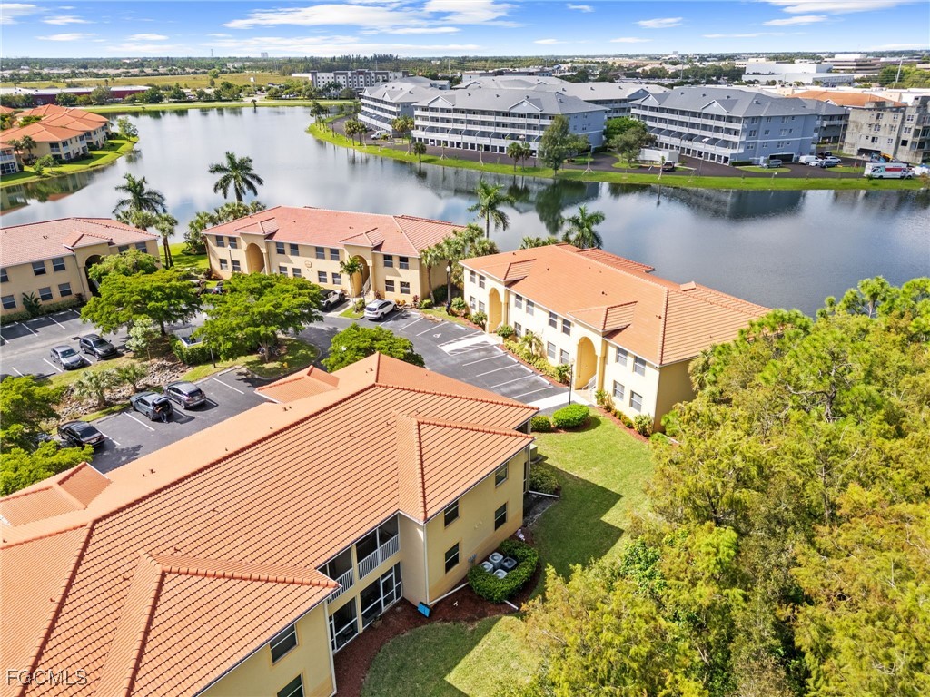 4191 Bellasol Circle, Unit 521 Fort Myers, FL 33916 - Photo 3 of 22 a view of a lake with a ocean view