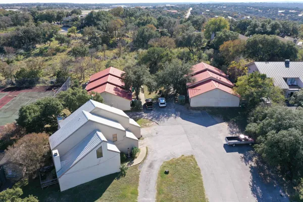 an aerial view of a house with a garden