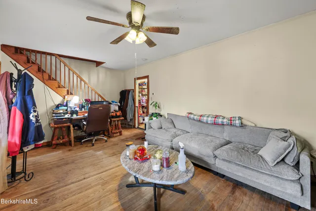 a utility room with cabinets dryer and washer