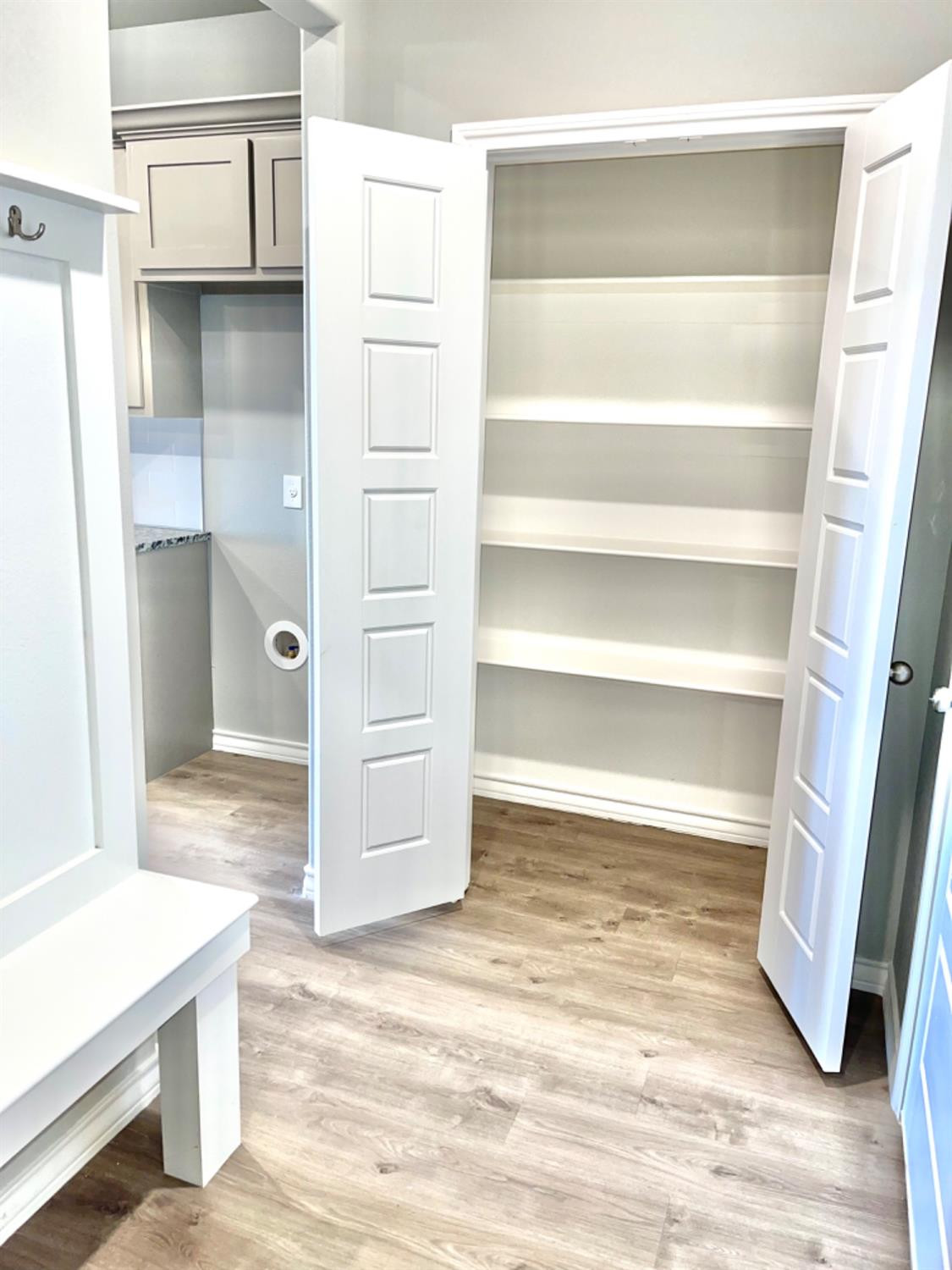7729 96th Street Lubbock, TX 79424 - Photo 29 of 35 a view of walk in closet with empty racks
