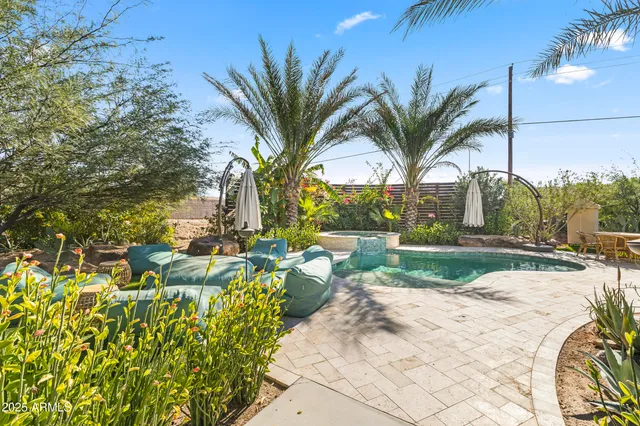 a view of yard with patio