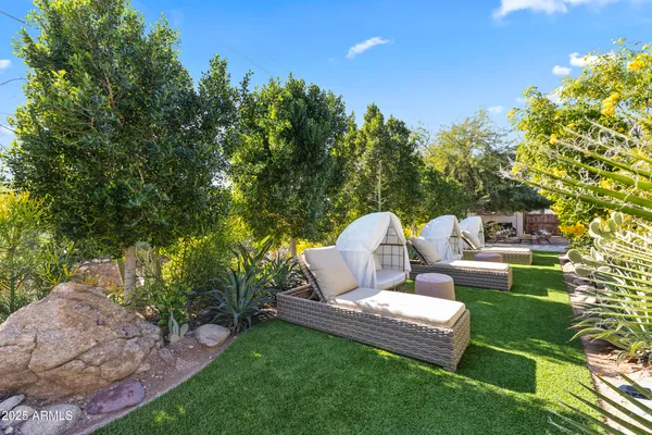 a backyard of a house with lots of green space