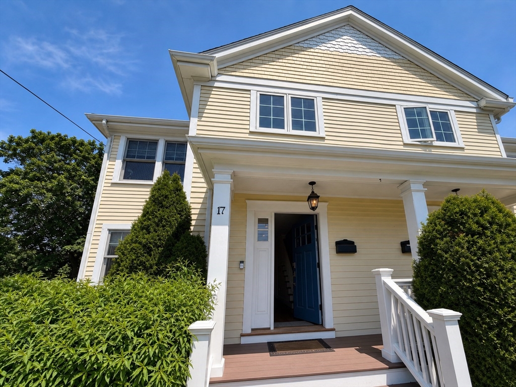 a front view of a house with a porch