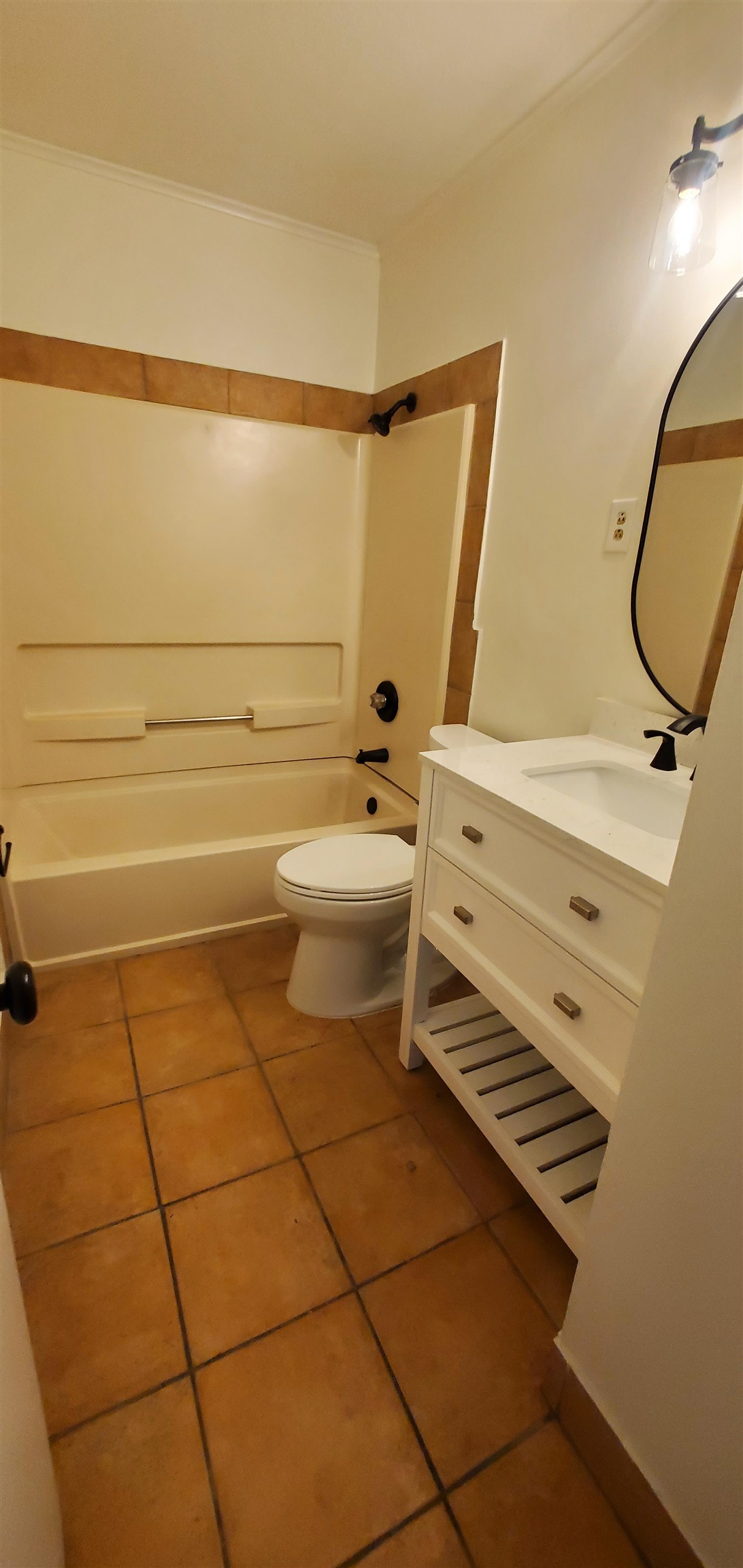 5352 Virgil Road Bartlett, TN 38134 - Photo 13 of 21 a bathroom with a toilet a sink and bath tub