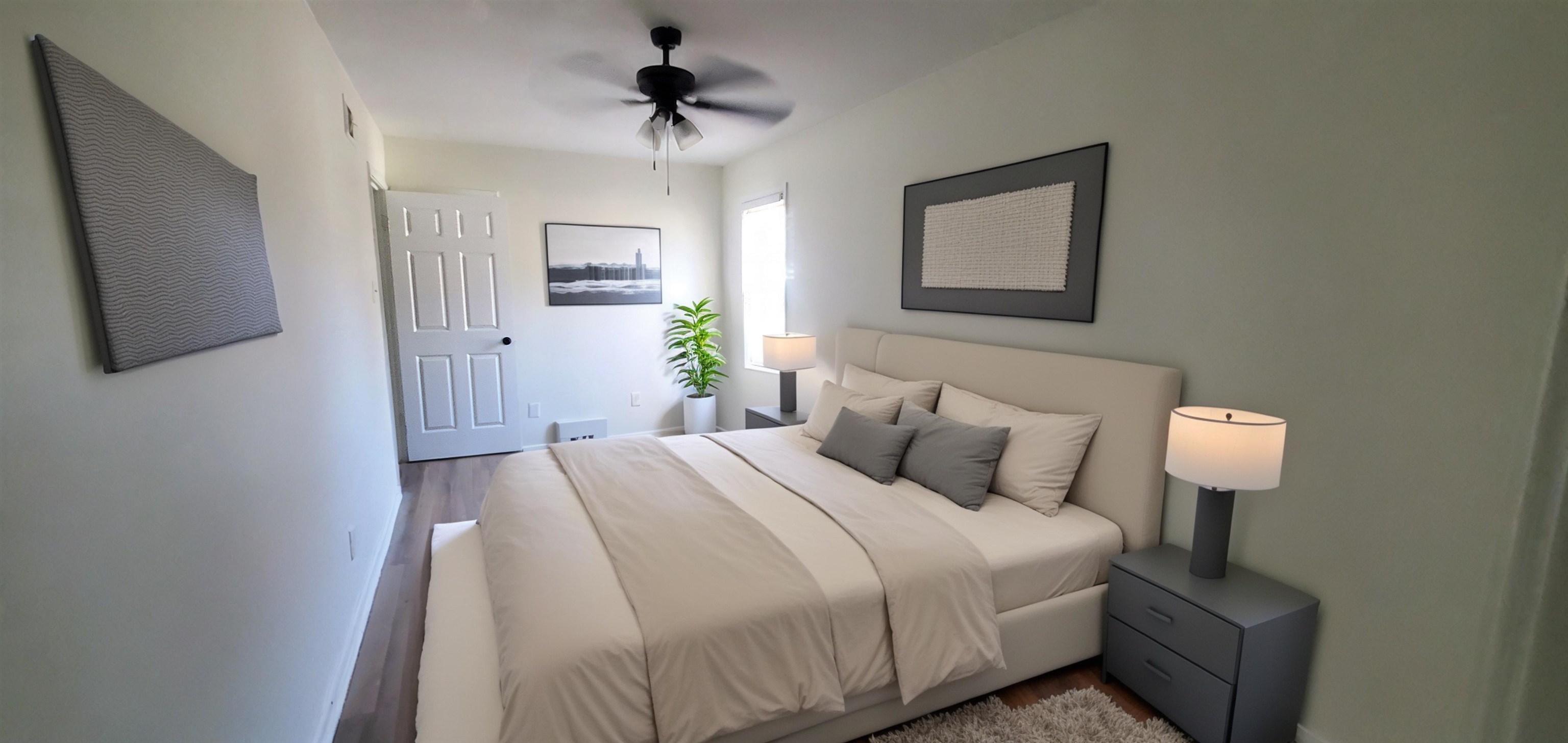 5352 Virgil Road Bartlett, TN 38134 - Photo 15 of 21 a bedroom with a bed and a lamp on table