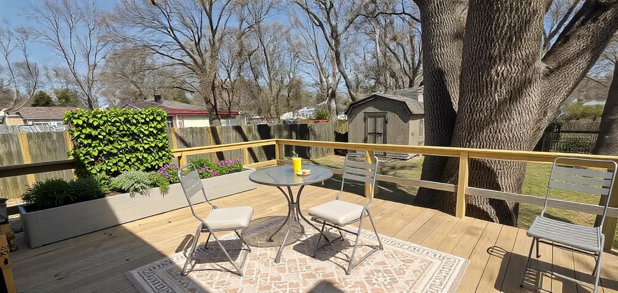 5352 Virgil Road Bartlett, TN 38134 - Photo 19 of 21 a view of a chairs and table on the wooden floor