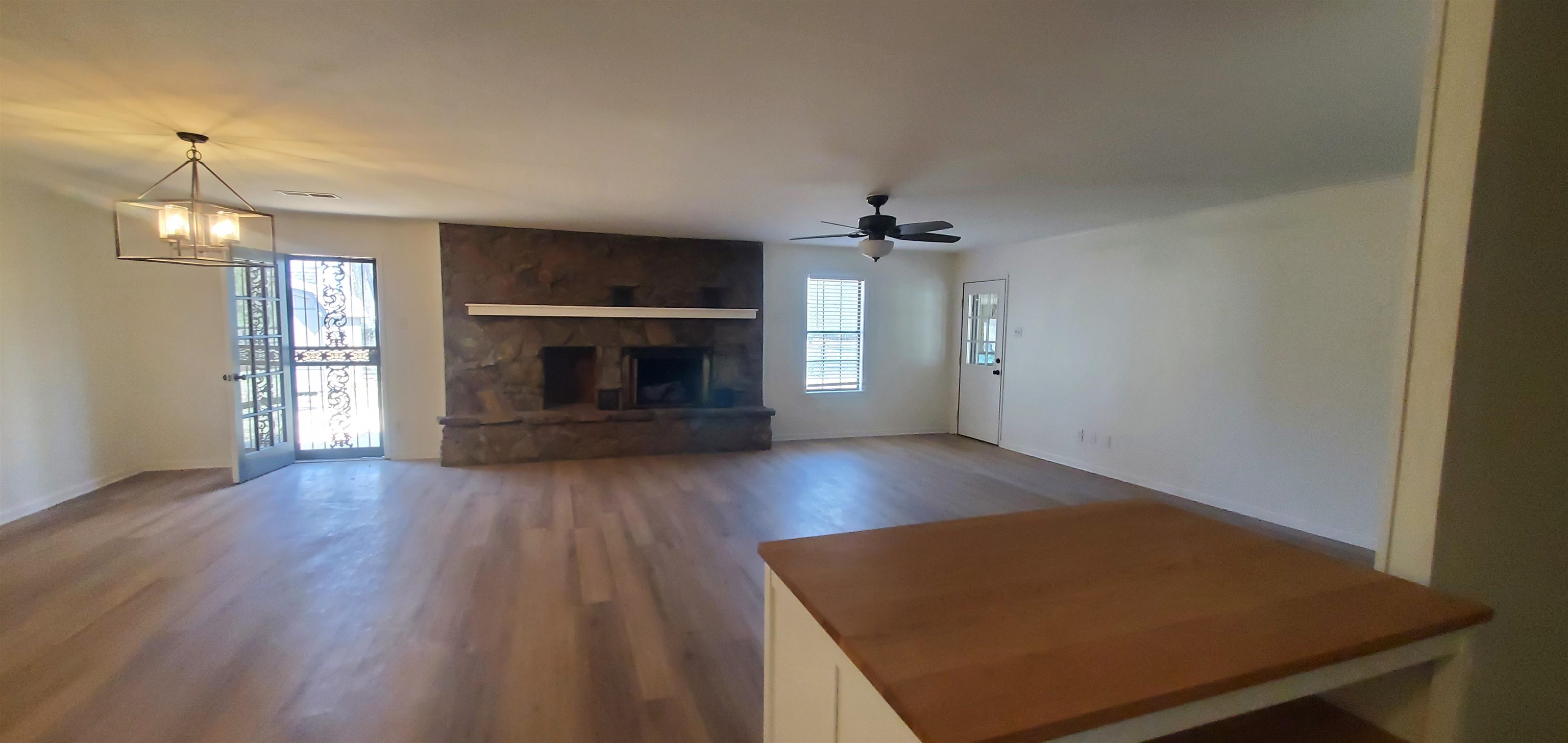 5352 Virgil Road Bartlett, TN 38134 - Photo 6 of 21 an empty room with windows and fireplace