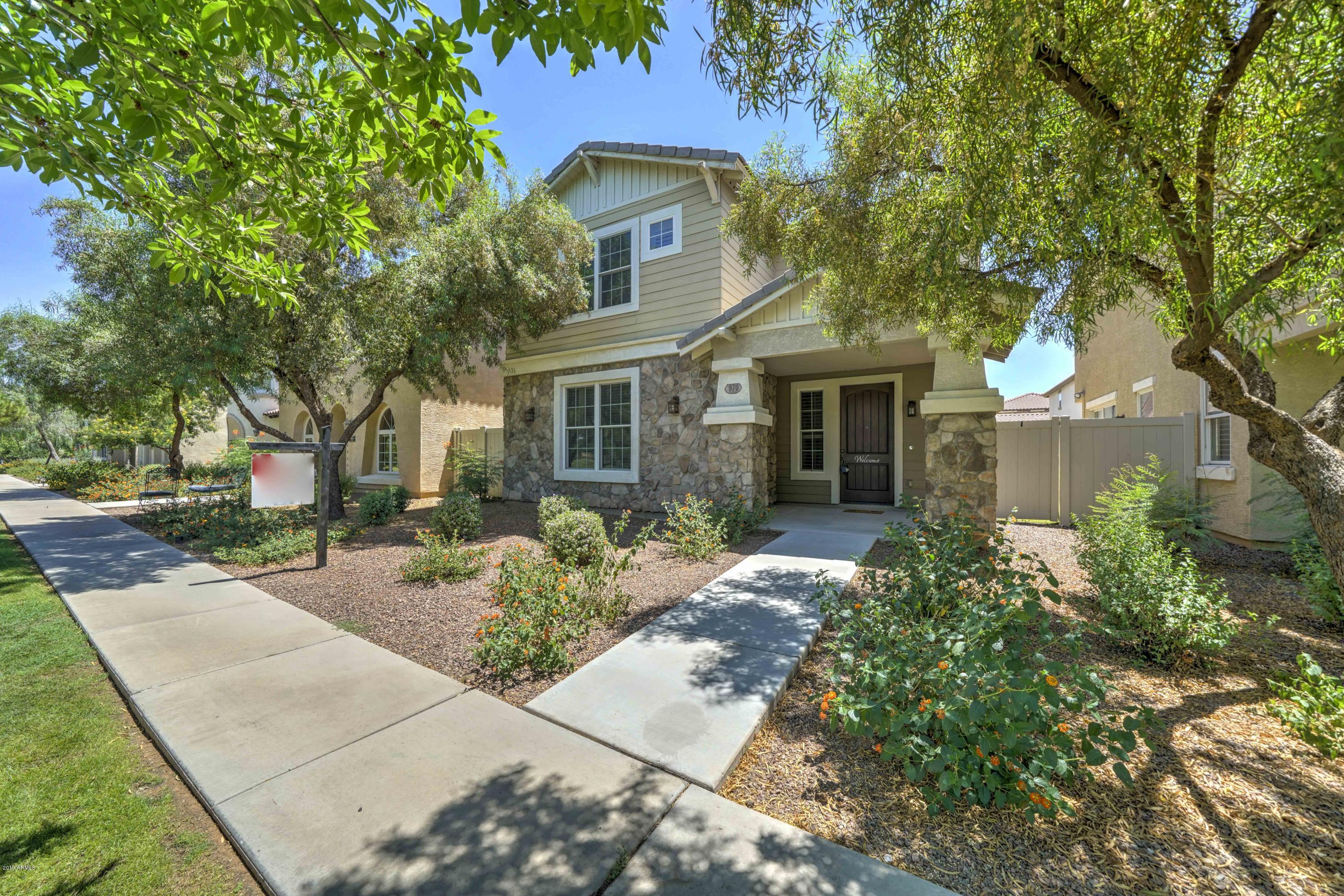 970 South Henry Lane Gilbert, AZ 85296 - Photo 1 of 51 front view of a house with a small yard
