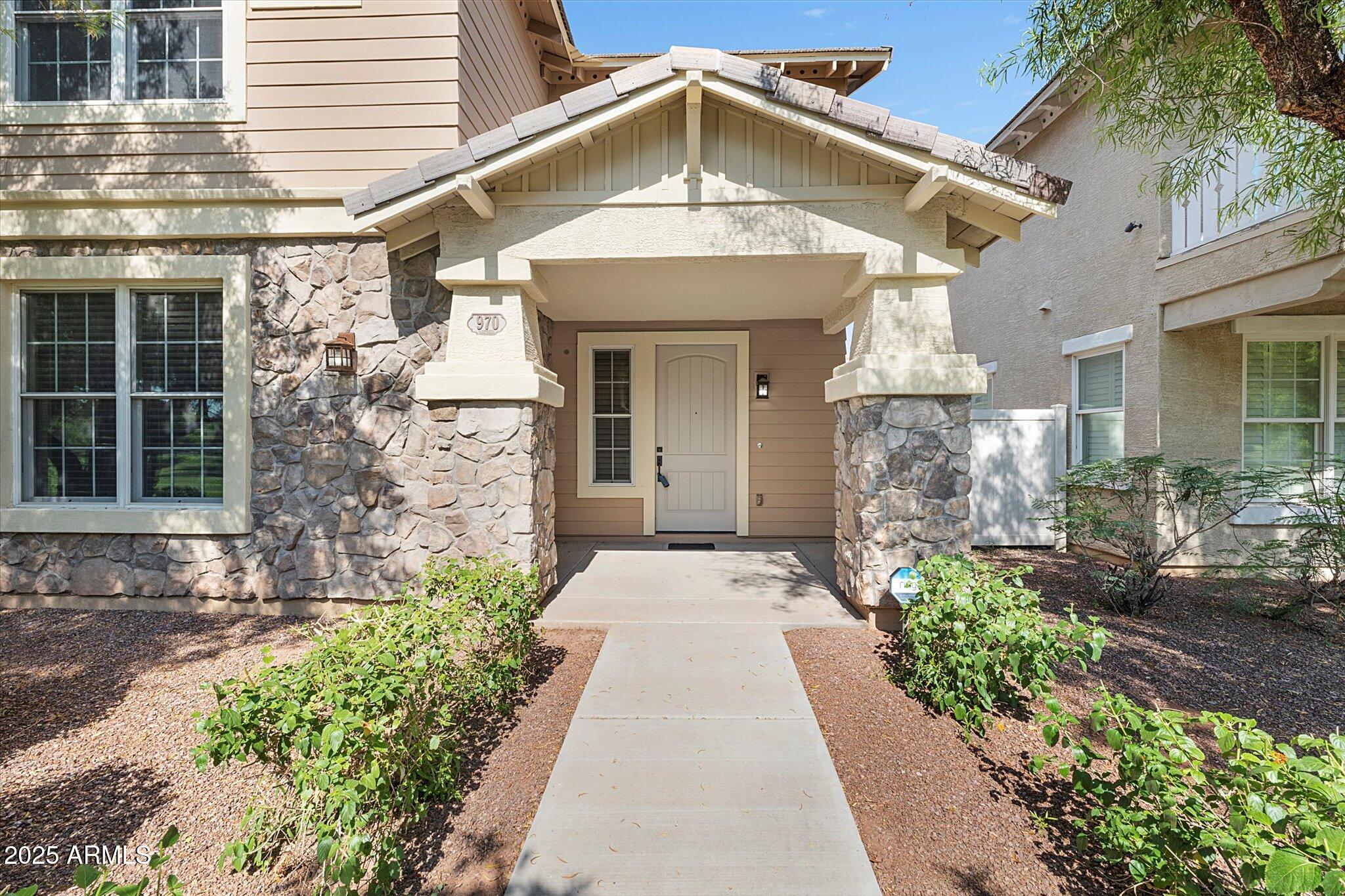 970 South Henry Lane Gilbert, AZ 85296 - Photo 20 of 51 a front view of a house with a yard