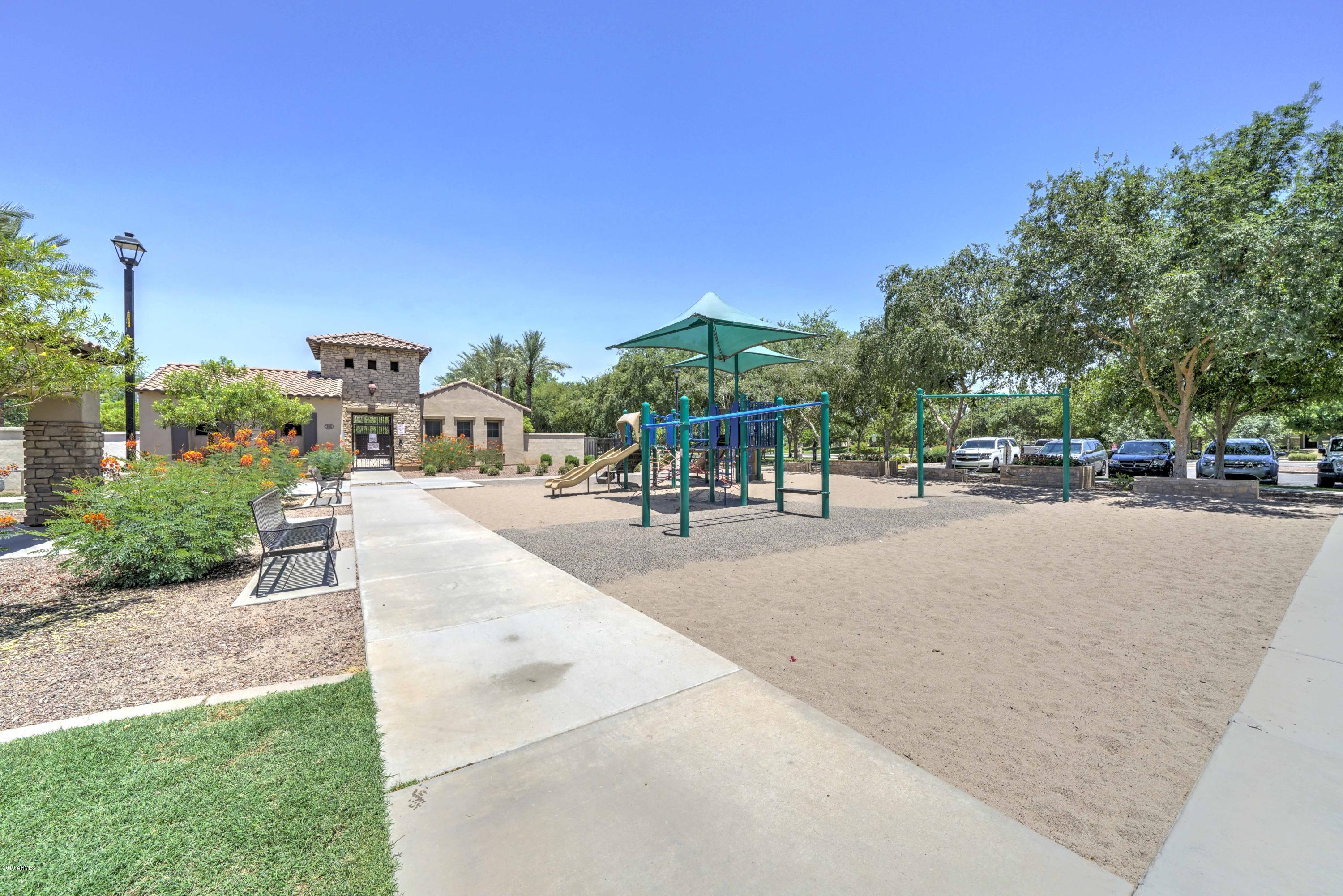 970 South Henry Lane Gilbert, AZ 85296 - Photo 24 of 51 a view of a street with houses