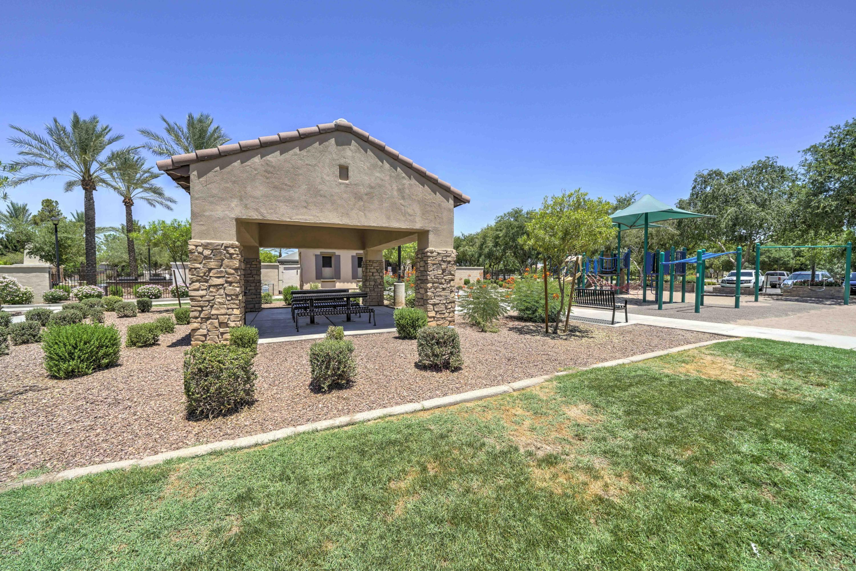 970 South Henry Lane Gilbert, AZ 85296 - Photo 25 of 51 a view of a house with backyard and sitting area