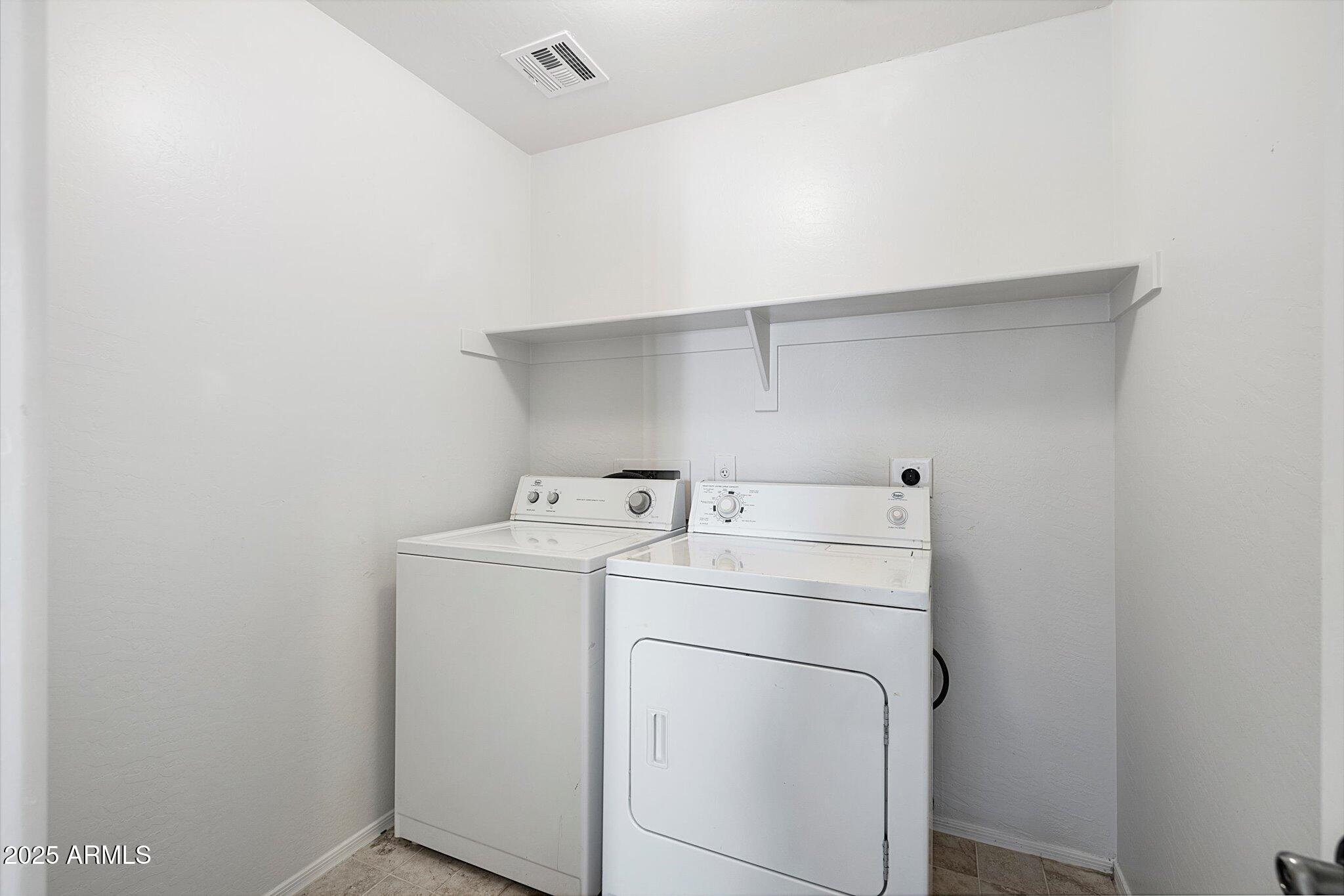 970 South Henry Lane Gilbert, AZ 85296 - Photo 39 of 51 a utility room with dryer and washer