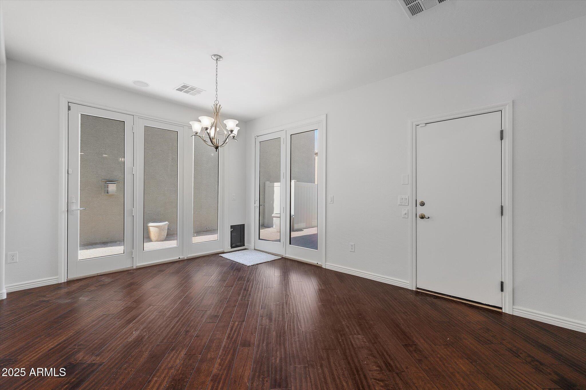 970 South Henry Lane Gilbert, AZ 85296 - Photo 45 of 51 a view of a room with wooden floor and ceiling fan