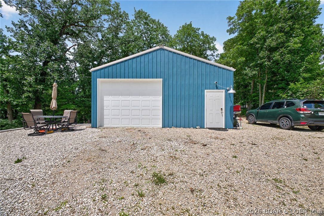 27444 Golden Beach Road Barnett, MO 65011 - Photo 23 of 42 Gravel patio & parking