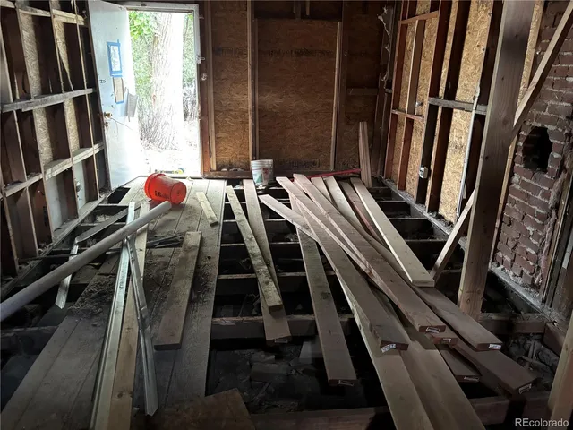 a view of balcony with furniture
