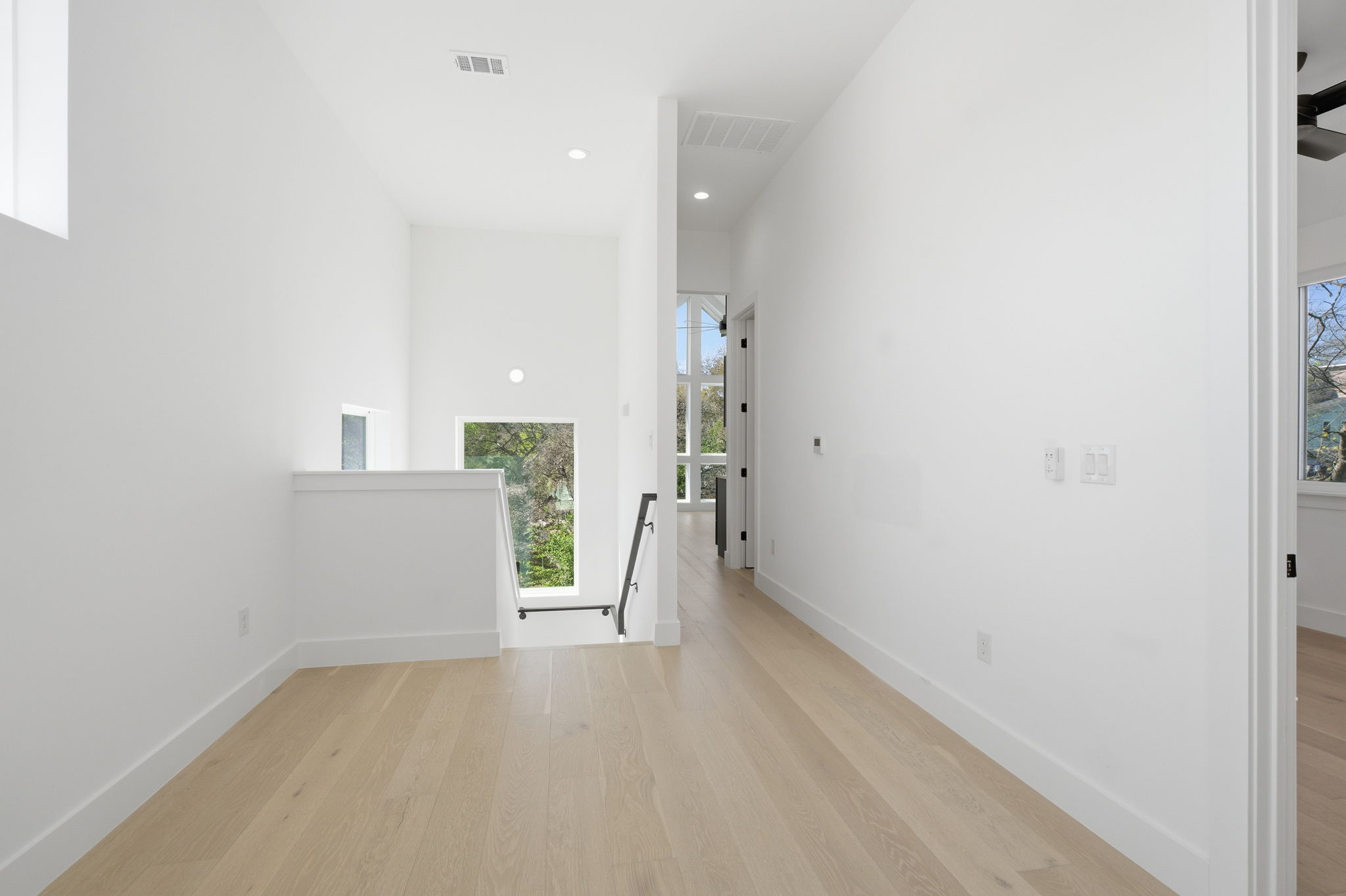 400 Post Rd Drive Austin, TX 78704 - Photo 15 of 23 a view of a room with wooden floor and a window