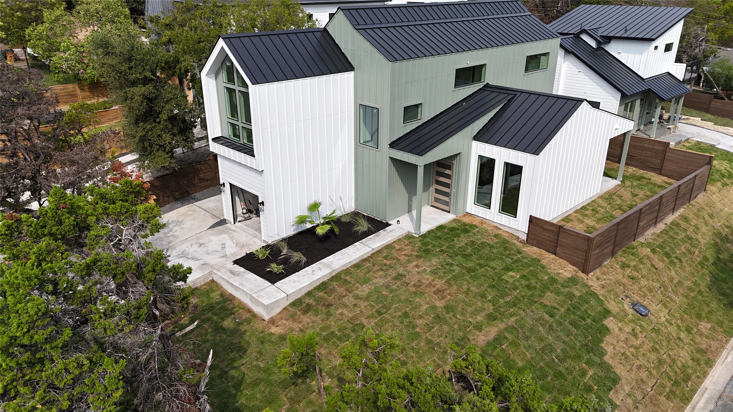 400 Post Rd Drive Austin, TX 78704 - Photo 2 of 23 an aerial view of a house with a yard