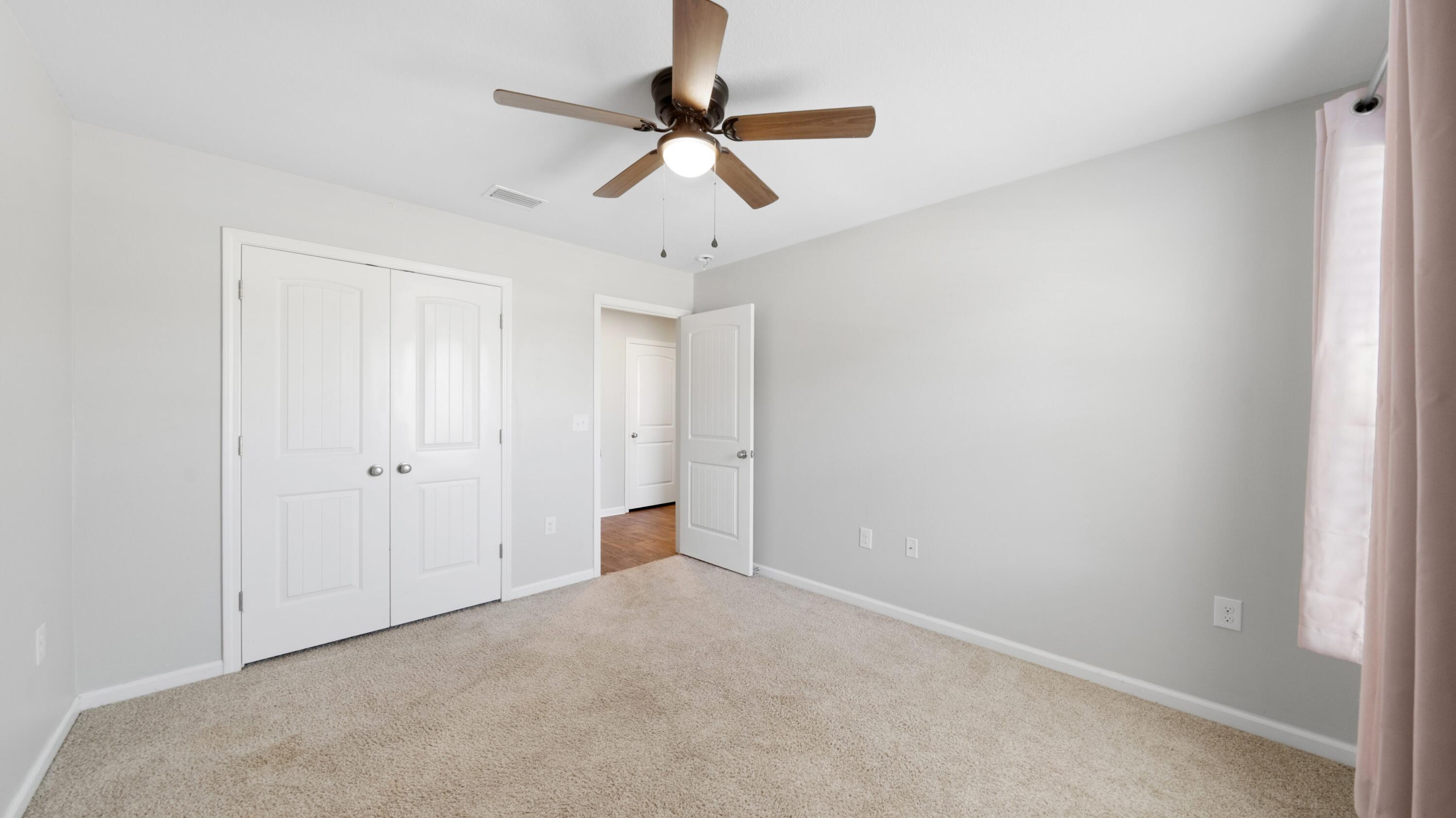 3927 Alva Thomas Road Panama City, FL 32404 - Photo 22 of 46 a view of an empty room