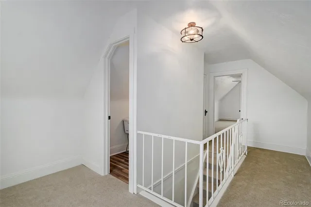 a view of hallway with stairs