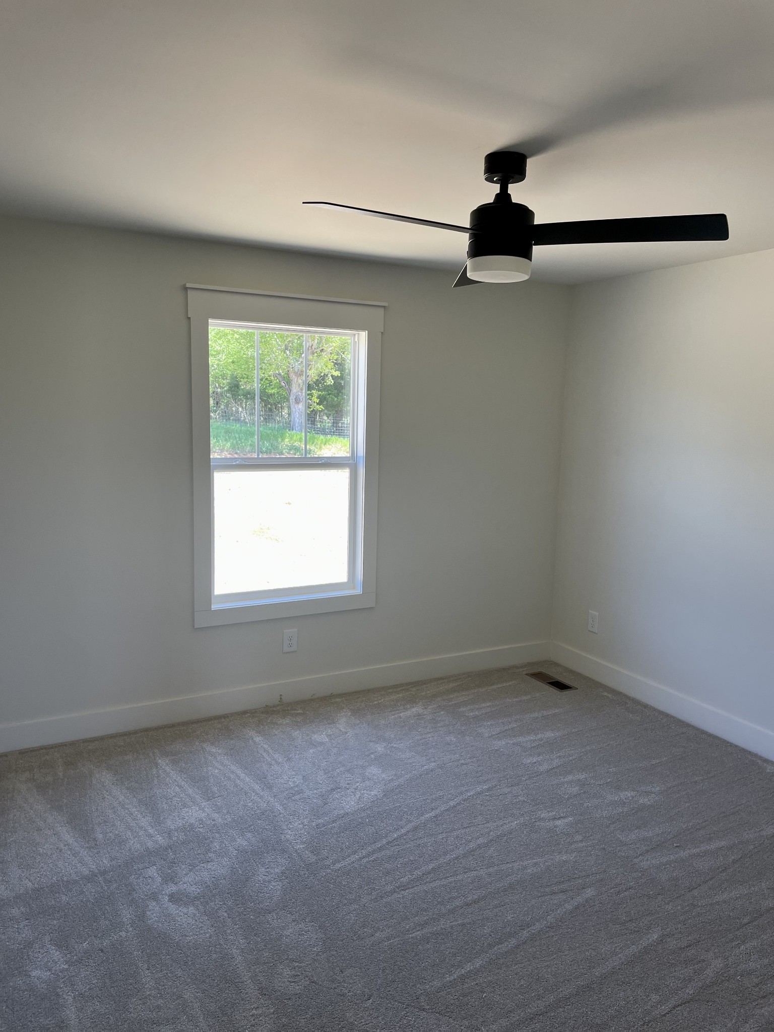 241 Tom Ferrell Road Portland, TN 37148 - Photo 19 of 21 an empty room with a window
