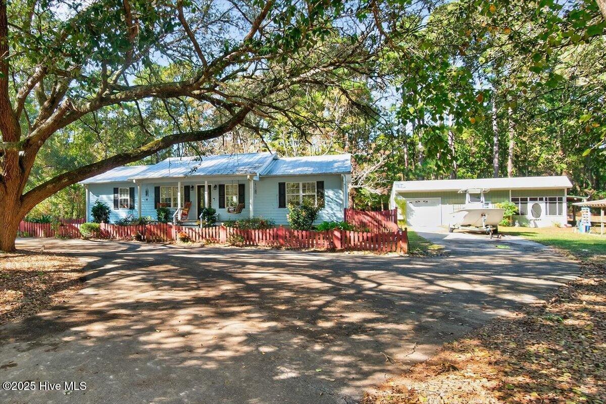 1109 Middle Sound Loop Road Wilmington, NC 28411 - Photo 5 of 49 Fiber cement siding and metal roof