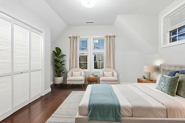 a bed room with a bed and a couch
