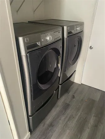 a utility room with dryer and washer