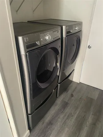 a utility room with dryer and washer
