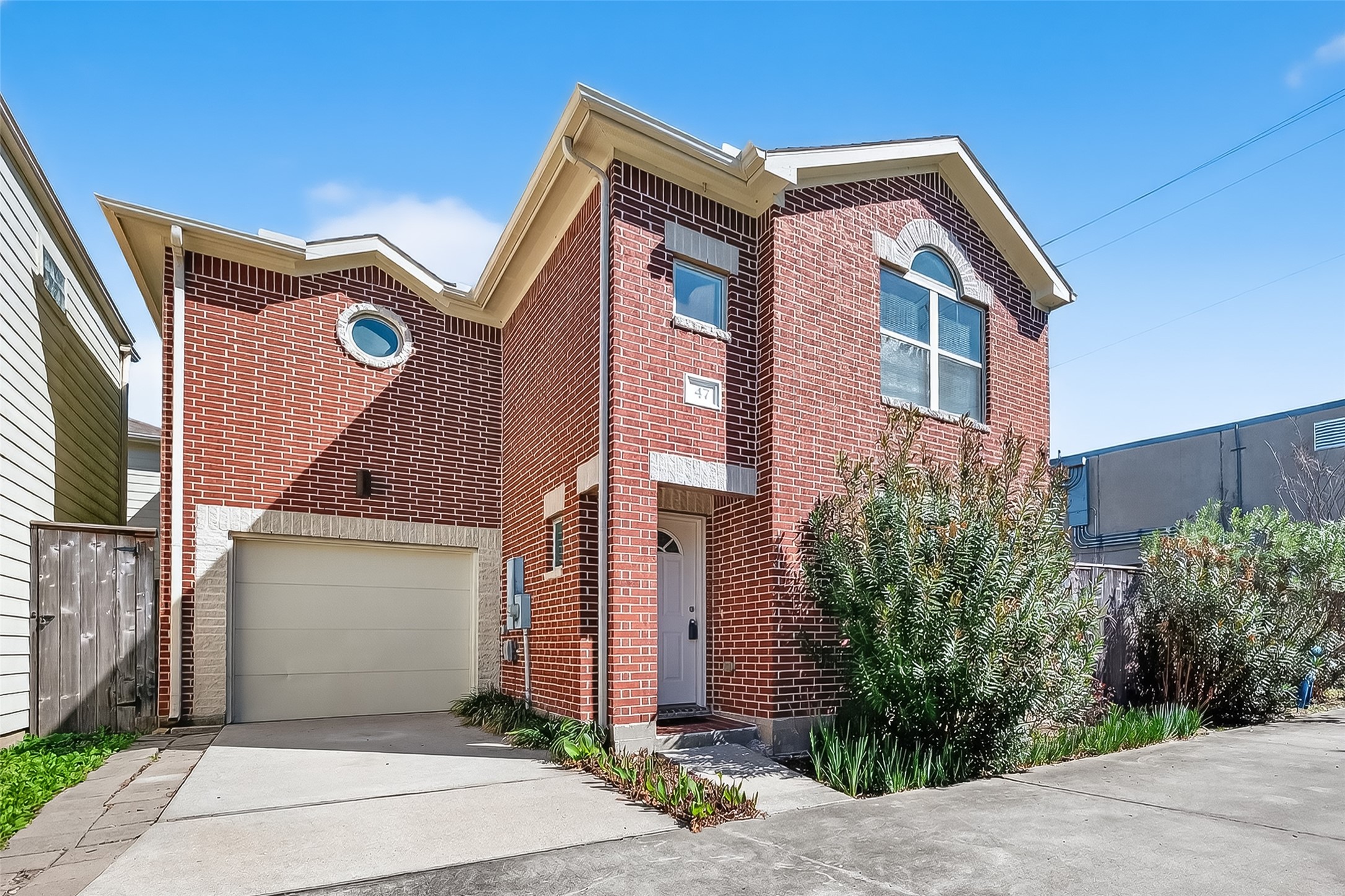5951 S Loop East, Unit 47 Houston, TX 77033 - Photo 1 of 37 This is a two-story, brick home with a single-car garage, driveway and extra parking in front. The front features a prominent window above the entrance and nice landscaping along the side.