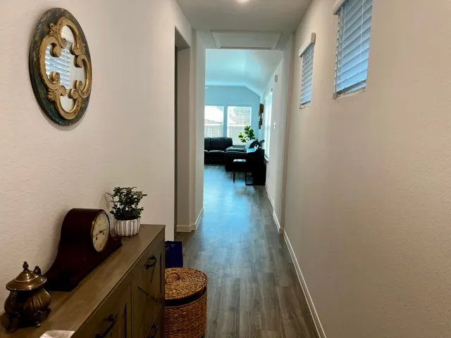 a view of a hallway with breakfast area