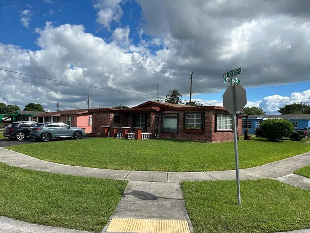 a house view with a garden space