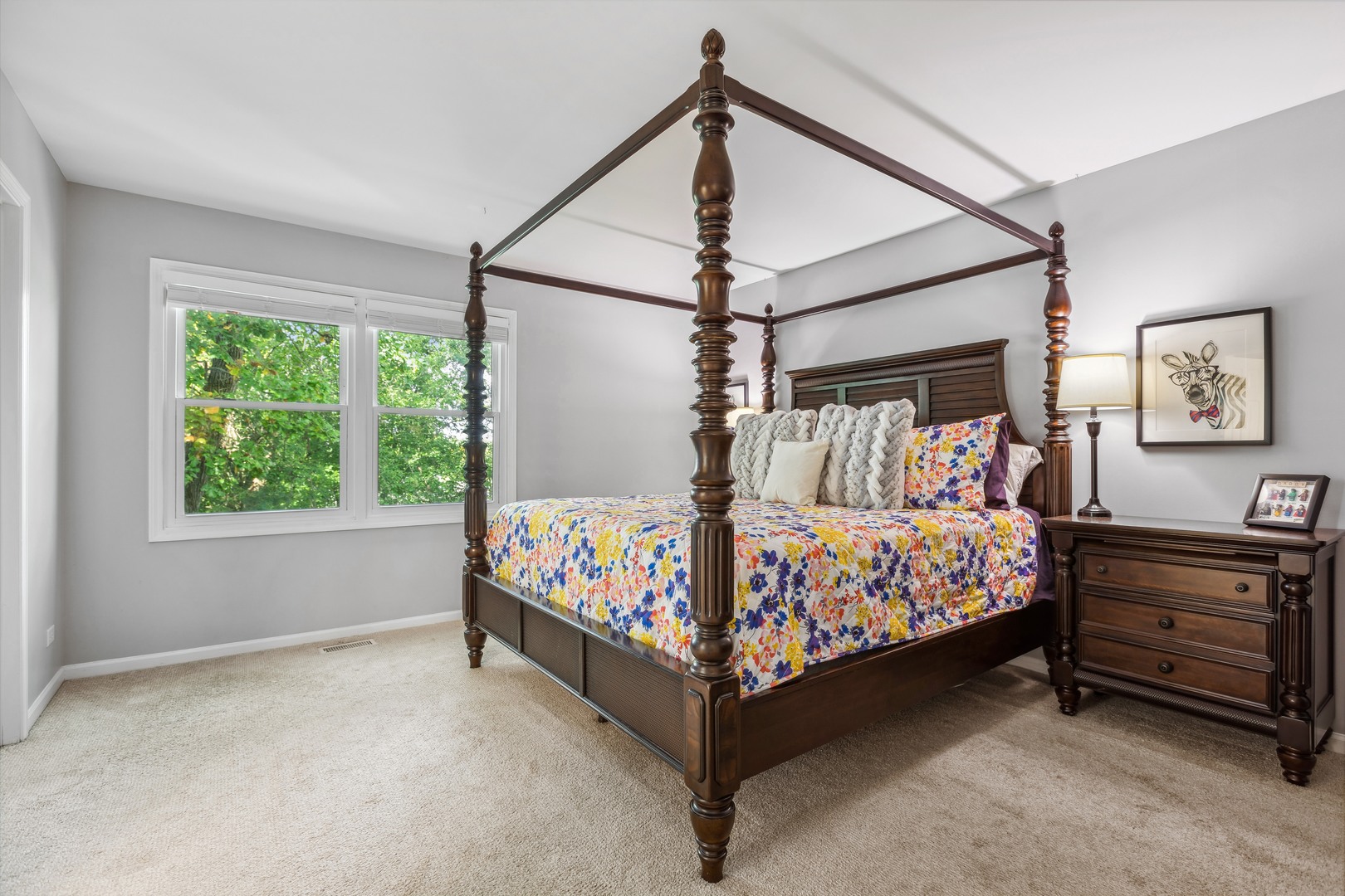 409 Hunters Way Fox River Grove, IL 60021 - Photo 11 of 22 a bedroom with a bed and a window