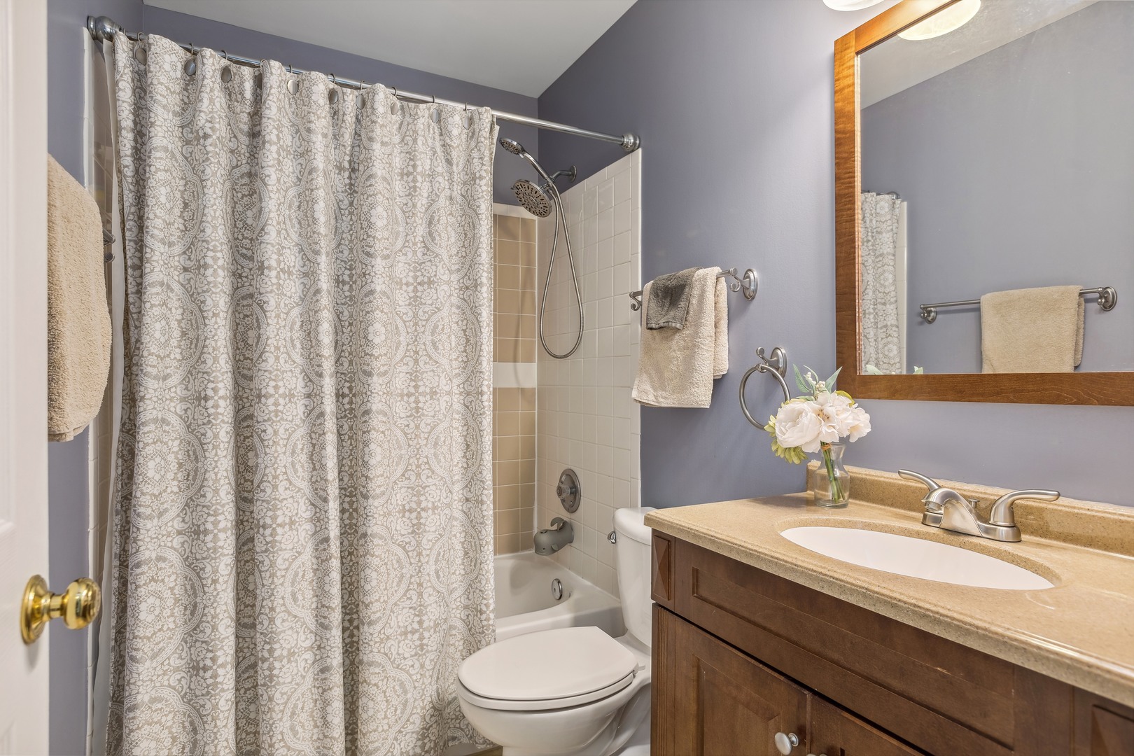 409 Hunters Way Fox River Grove, IL 60021 - Photo 13 of 22 a bathroom with a granite countertop sink and a mirror