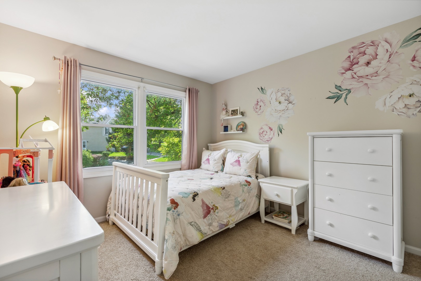 409 Hunters Way Fox River Grove, IL 60021 - Photo 14 of 22 a bedroom with a bed and a window