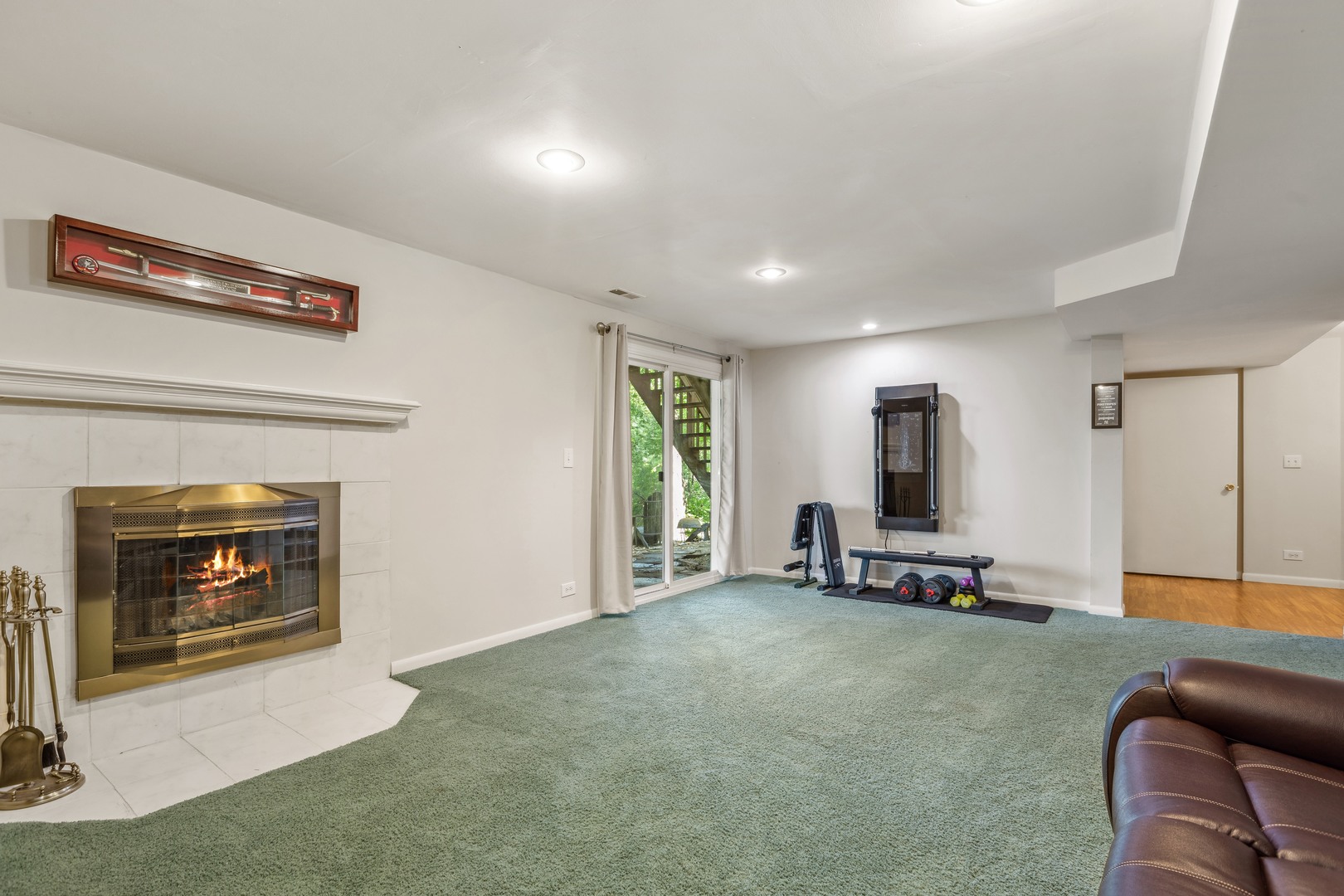 409 Hunters Way Fox River Grove, IL 60021 - Photo 16 of 22 a living room with furniture a window and a fireplace