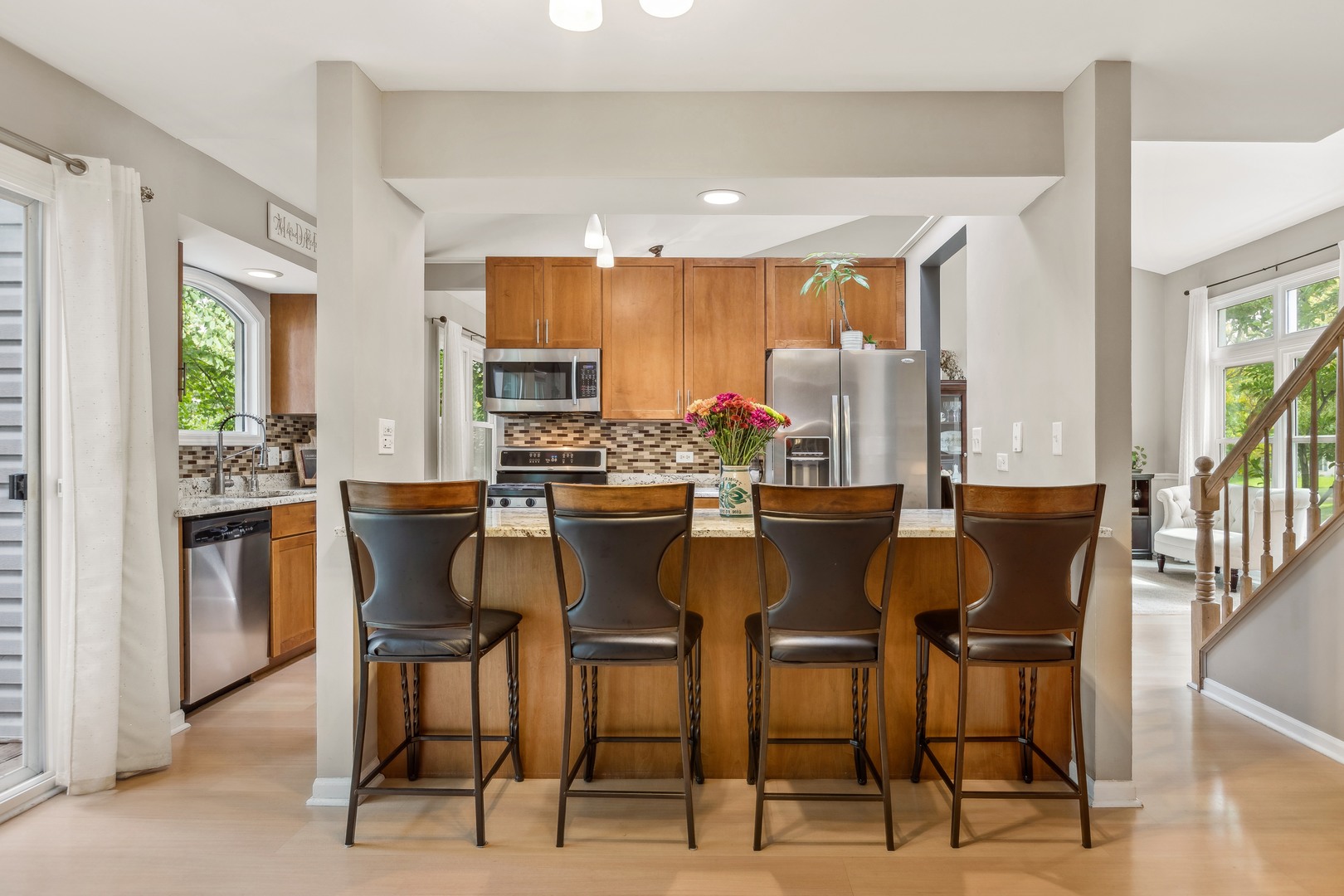 409 Hunters Way Fox River Grove, IL 60021 - Photo 2 of 22 a dining room with furniture and wooden floor