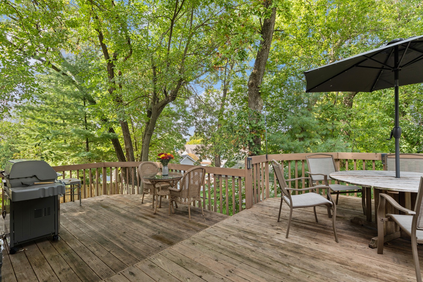 409 Hunters Way Fox River Grove, IL 60021 - Photo 21 of 22 a view of deck with furniture and trees