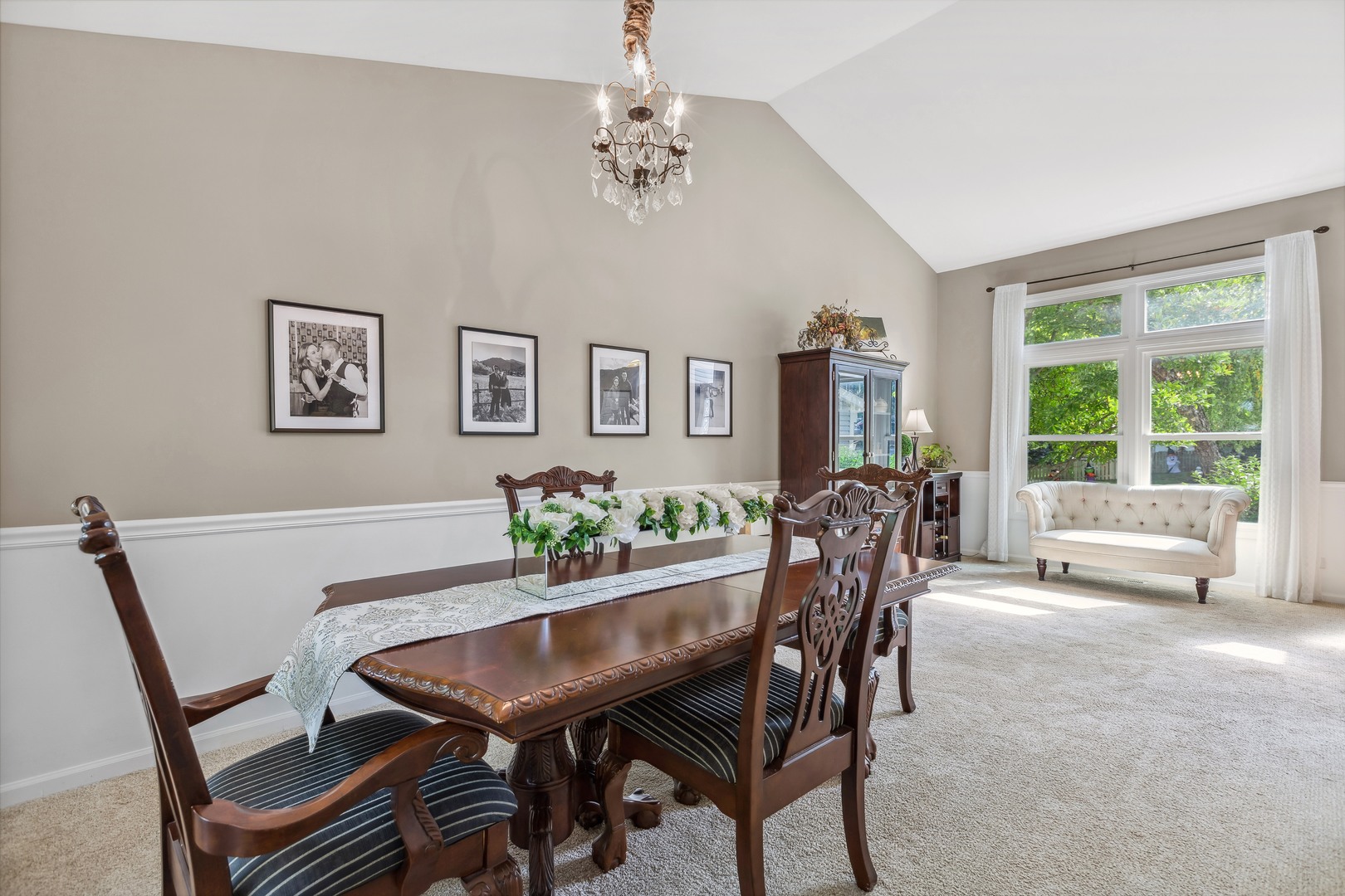 409 Hunters Way Fox River Grove, IL 60021 - Photo 6 of 22 a view of a dining room with furniture and a chandelier