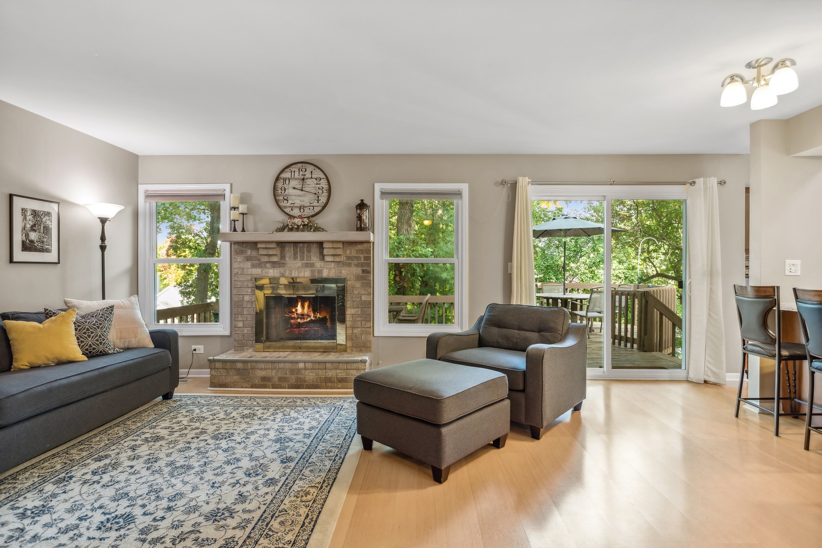 409 Hunters Way Fox River Grove, IL 60021 - Photo 9 of 22 a living room with furniture and a fireplace