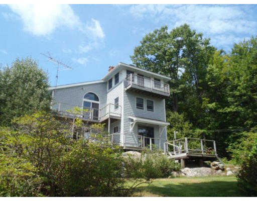 71 West Hill Road Middlefield, MA 01235 - Photo 3 of 29 a front view of a house with a yard