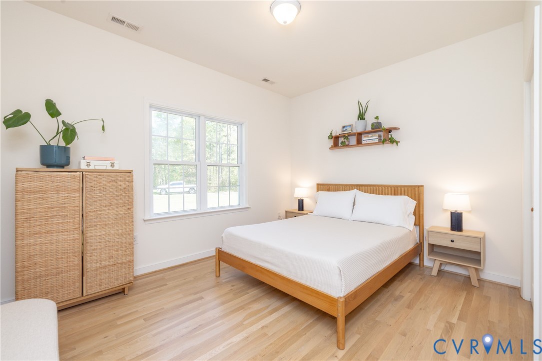 15618 Rowlett Road Chesterfield, VA 23838 - Photo 12 of 29 a bedroom with a bed and window