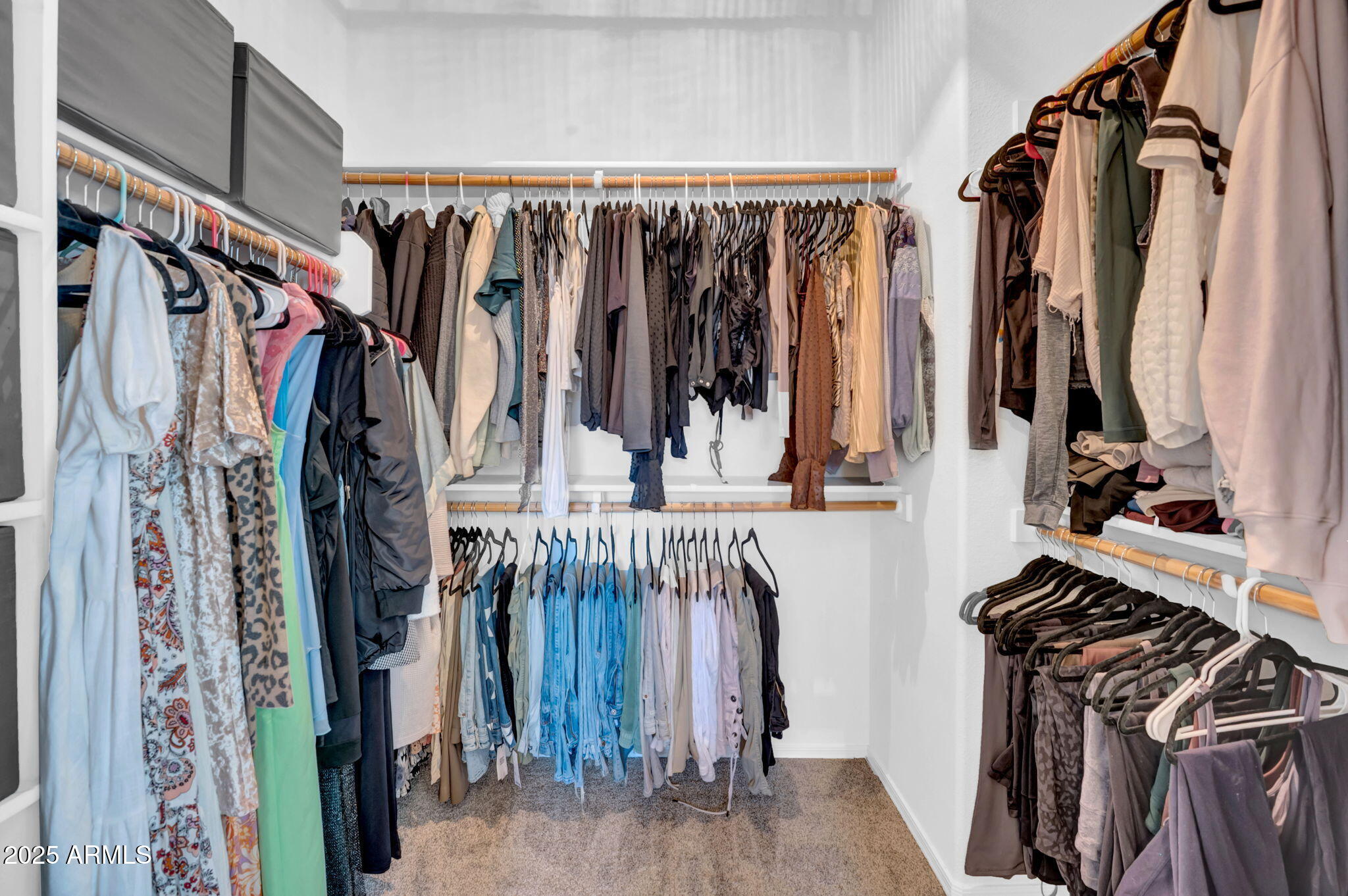 2929 North 37th Street, Unit 10 Phoenix, AZ 85018 - Photo 9 of 18 a view of walk in closet with clothes